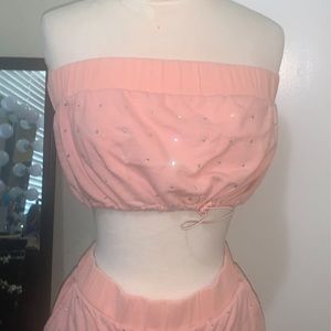 A pink 2 piece